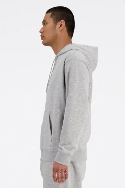 New Balance Sudadera con capucha deportiva^Hombre Sudaderas